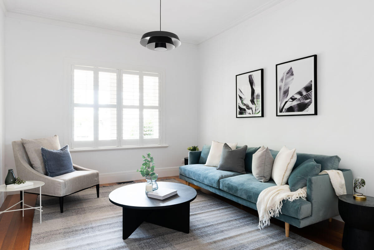 Blue velvet sofa, formal living room, property styling